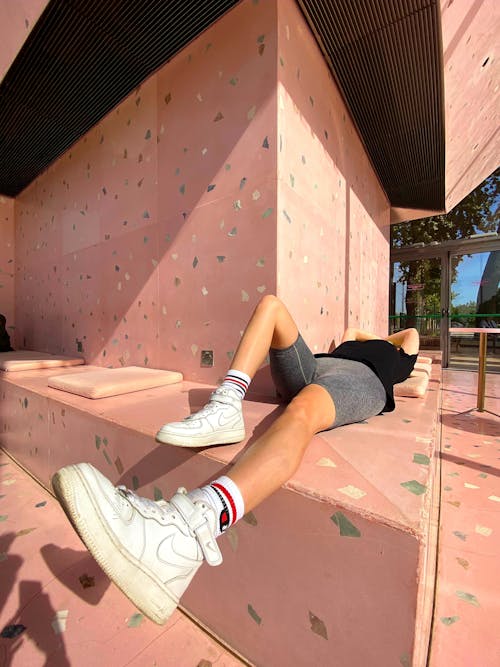 A Person Lying on the Bench