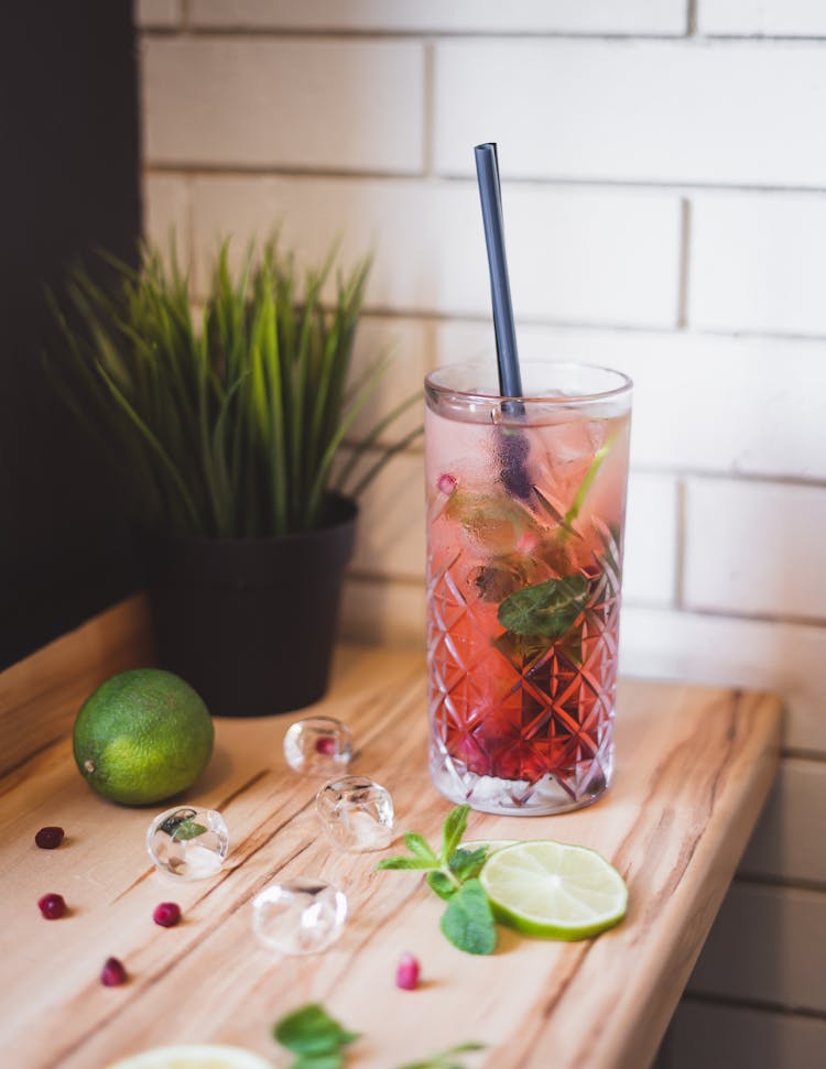 Pink Drink With Lime And Mint In Tall Glass