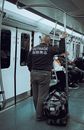 A Man Riding a Train
