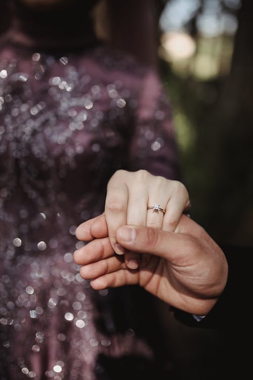 Woman Hand Wearing Ring Holding Man Hand