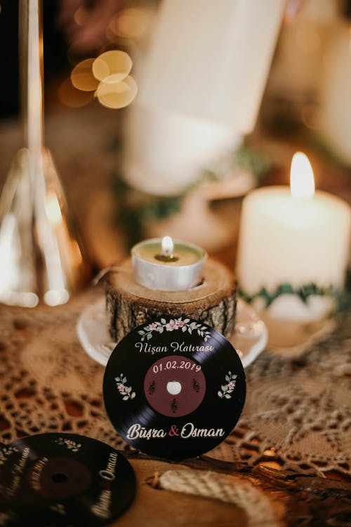 Vinyl Records and Candles on a Textile