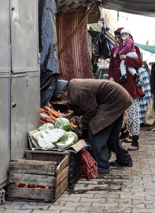 A Vegetable Vendor in the Street