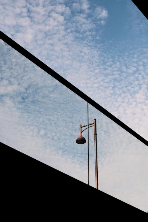 Photos gratuites de ciel bleu, contre-plongée, lampadaire