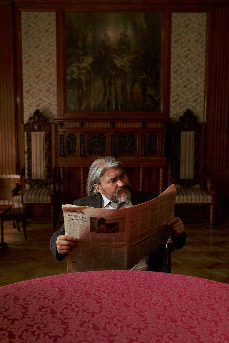 Old Man Reading Newspaper