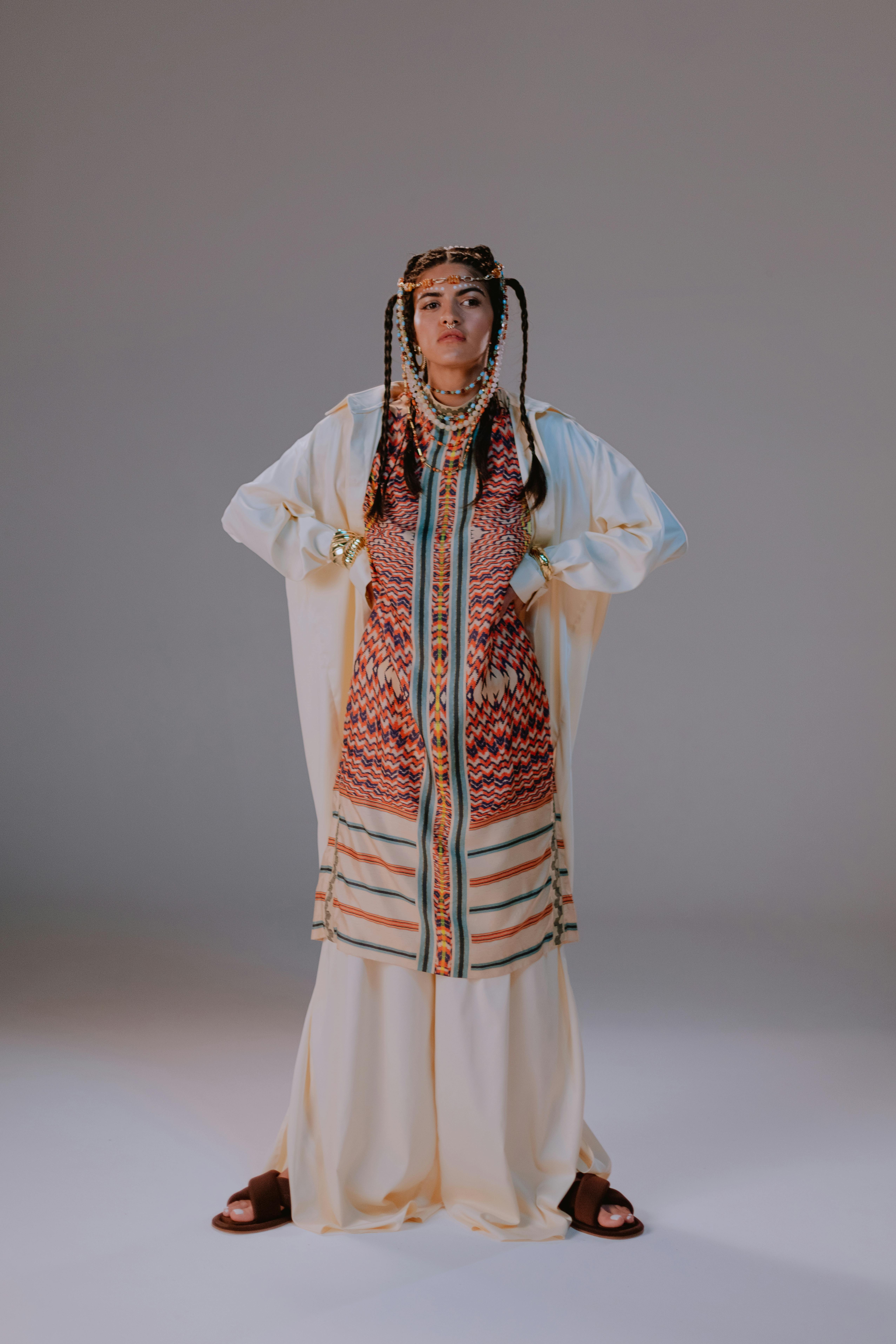 Free A Woman in White and Red Dress Stock Photo