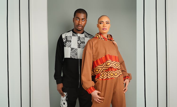 Bald Couple In Designer Clothes