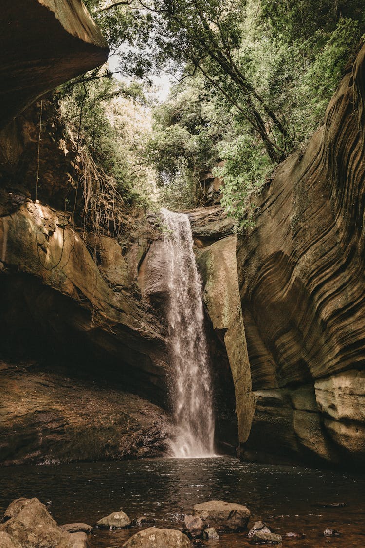 Scenic View Of A Waterfall In A Cave