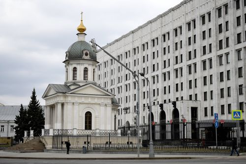 Free Exterior view of Saints Boris and Gleb Chapel with nearby building in Moscow. Stock Photo