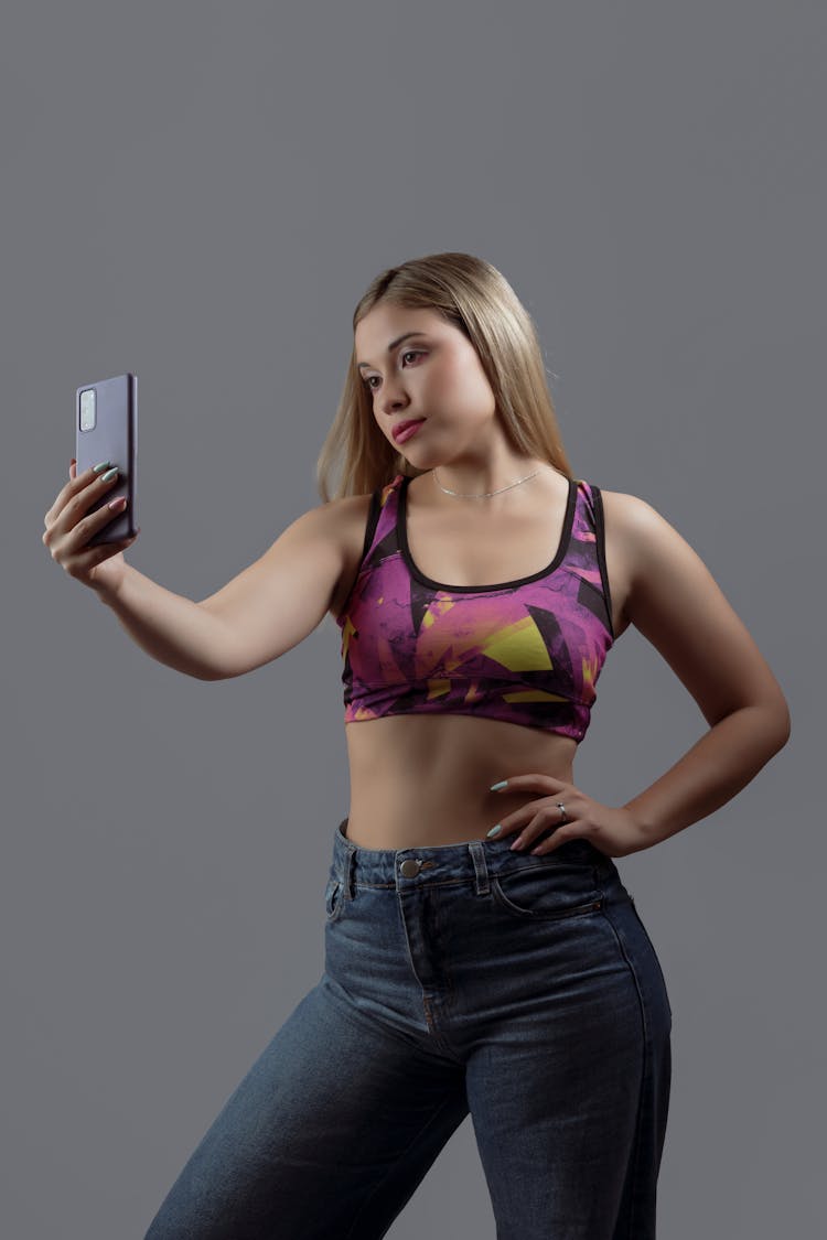 A Sexy Woman Taking A Selfie