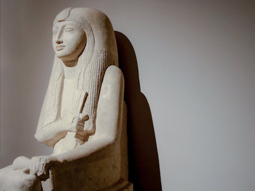 White Concrete Statue of a Woman