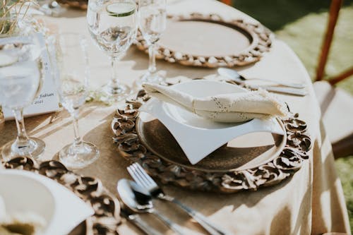 Free Table with Bowl and Napkin and Wineglasses Stock Photo