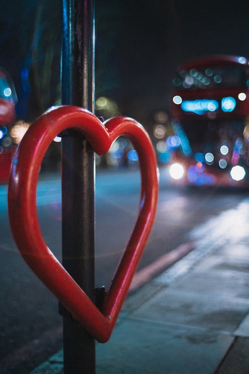 Free Red Metal Heart Shaped on a Post Stock Photo