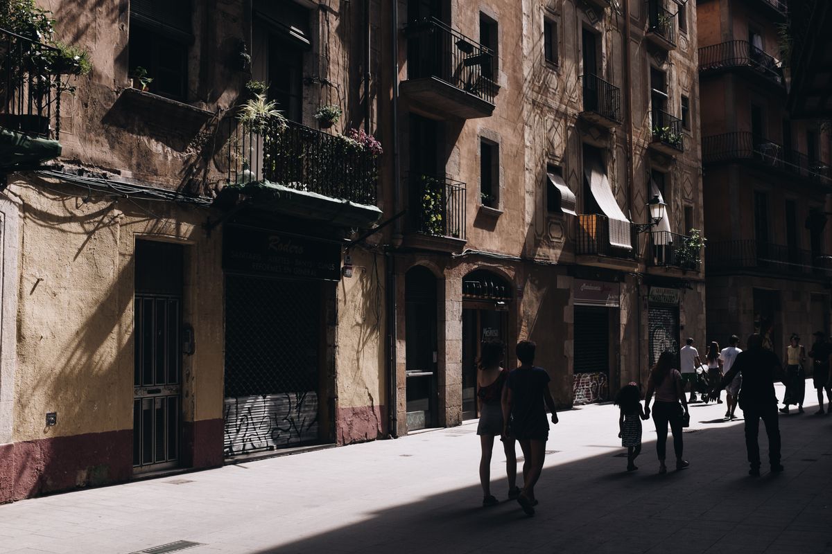 Bustling street in Barcelona with historical architecture