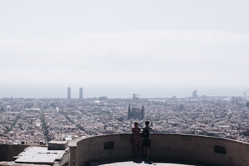 Photo of Two People at the Rooftop
