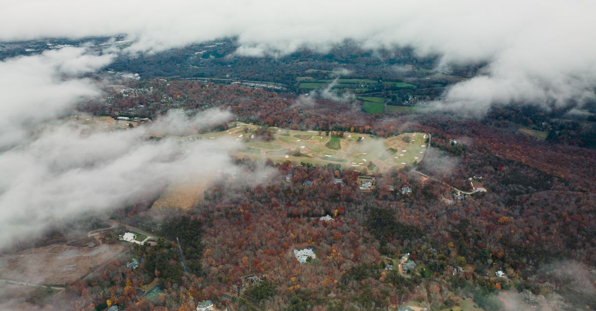Explore the stunning aerial view of autumn foliage and landscape at Lookout Mountain, GA.