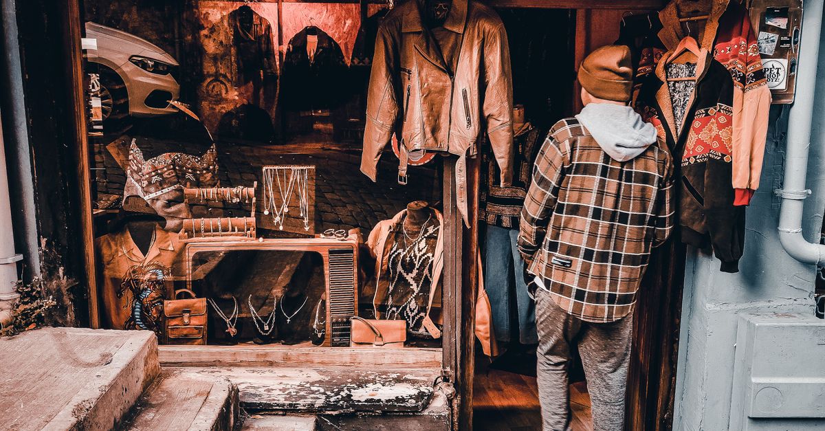 Representative shopper browsing an independent clothing store