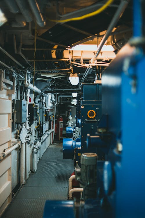 Gratis stockfoto met buizen, gebouw, industriële fabriek