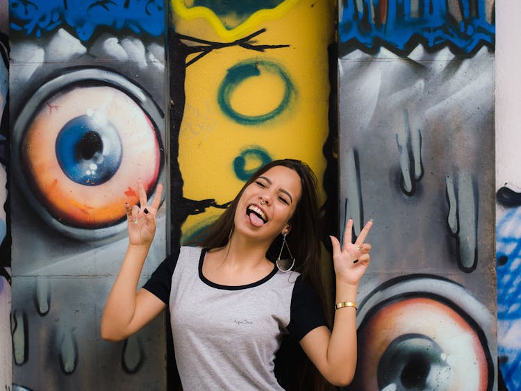 Fun Portrait Of Woman Against Mural