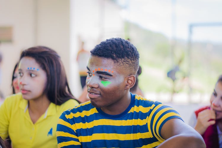 Woman And Man With Painted Faces