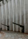 Black Metal Stand Near White Concrete Building