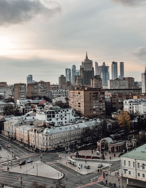 Free Dynamic cityscape featuring a mix of historic architecture and modern skyscrapers. Stock Photo
