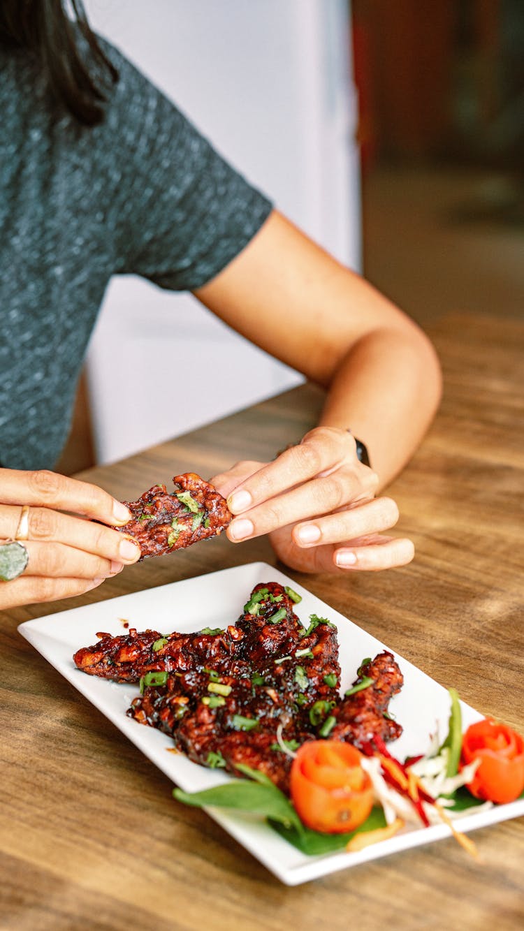 Woman Eating Meat Meal