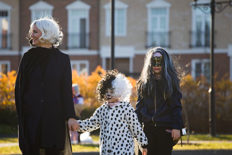 A Family Wearing Halloween Costumes