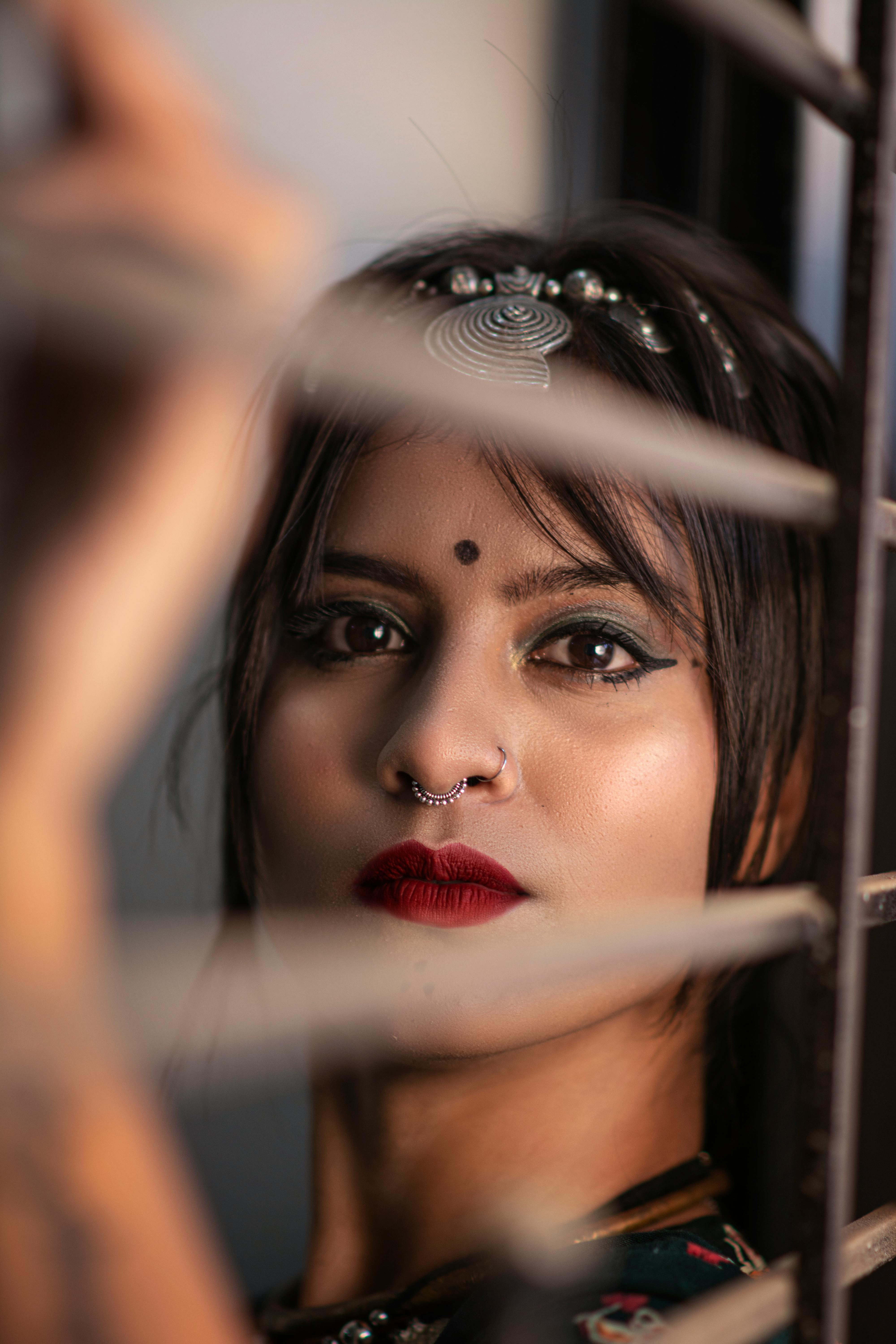 Celebrity figure interacting with fans and photographers, highlighting the buzz element of fame.