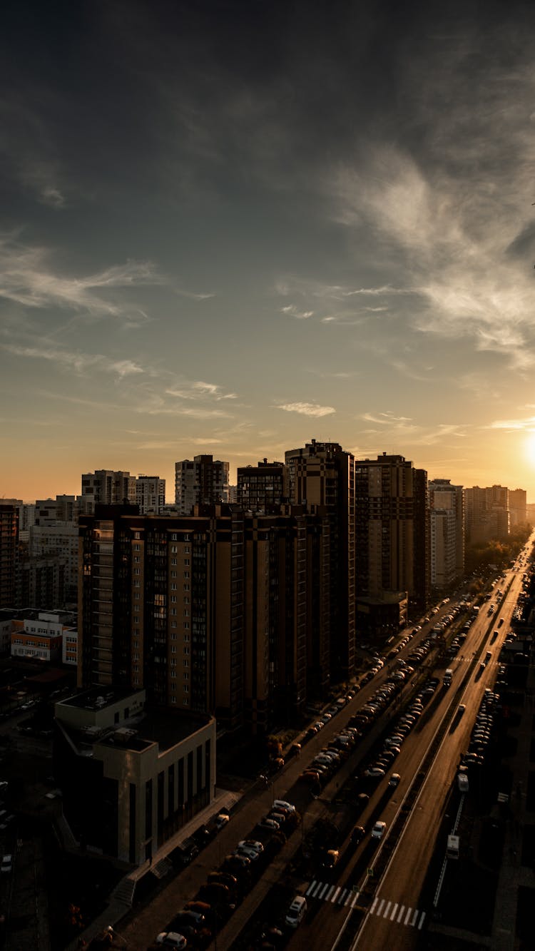 Skycrapers By The Street At Dusk