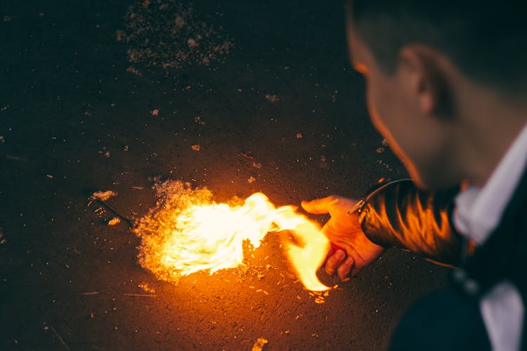 Man Touching Fire