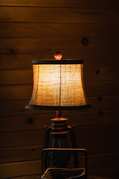 Vintage Table Lamp Beside a Wooden Wall