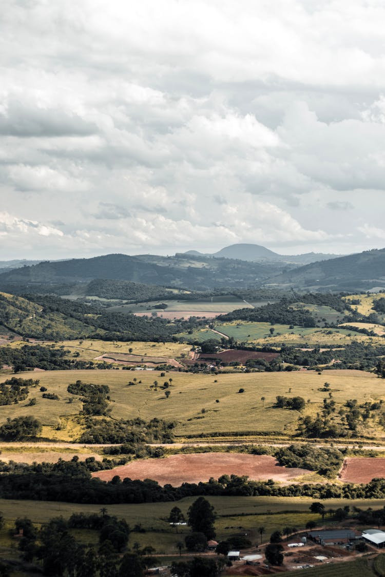 Clouds Over Plains And Hills