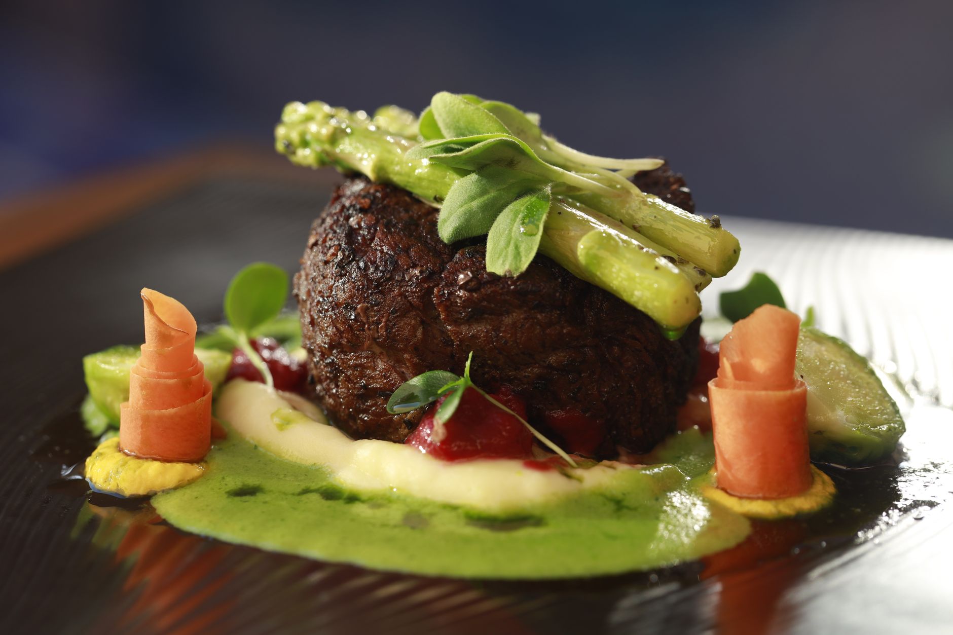 Steak Oscar with stone crab and béarnaise sauce plated