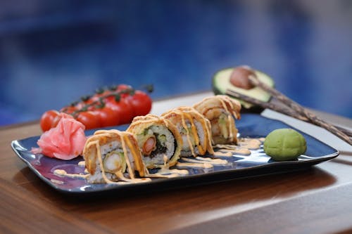 Foto profissional grátis de alimento, chapeamento, comida japonesa