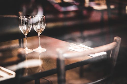 Two Wine Glasses Standing on Coffee Table