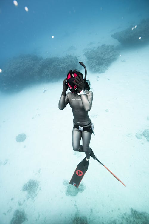 Diver with Diving Equipment Underwater