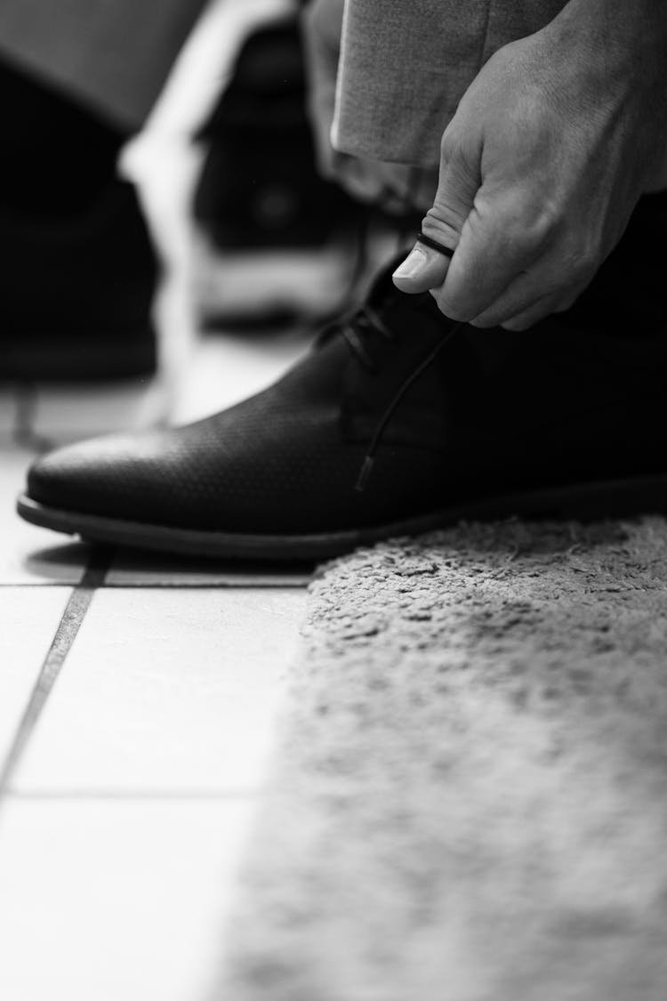 Hands Tying Shoe