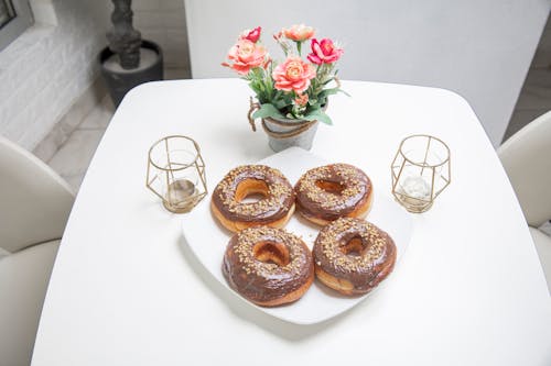 Free Donuts on White Ceramic Plate Stock Photo