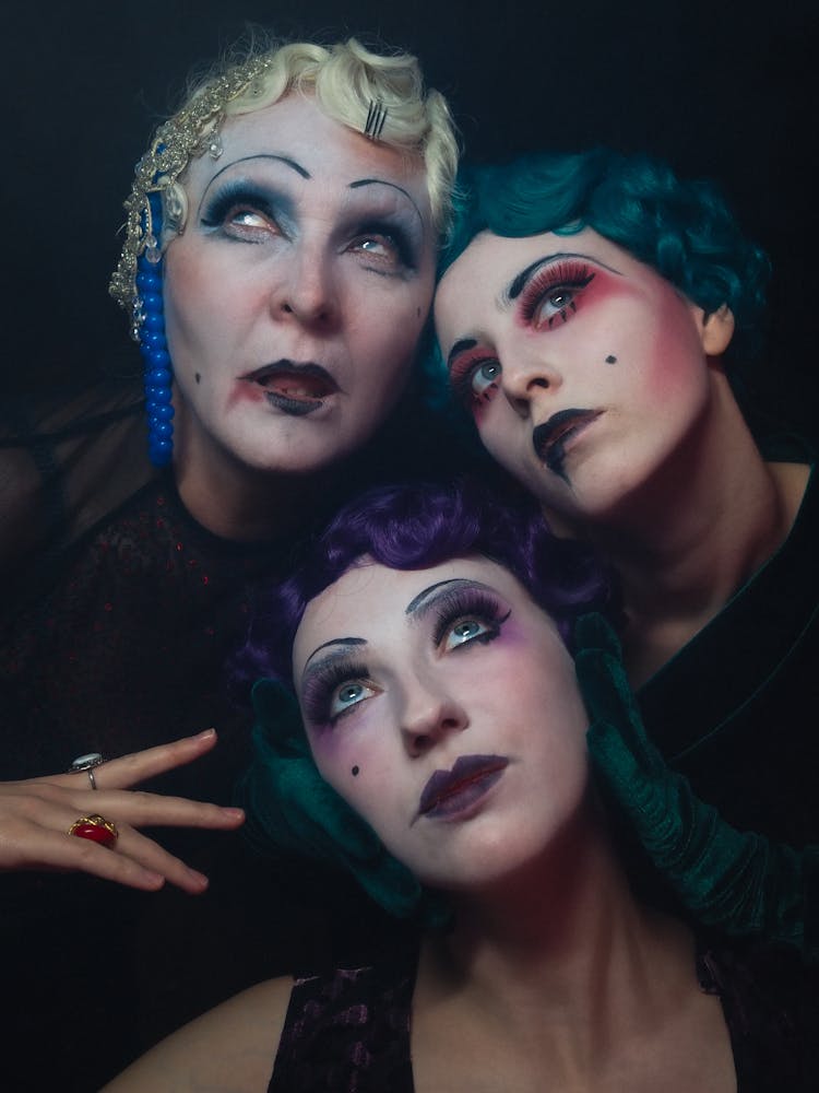 Three People With Heavy Make-Up