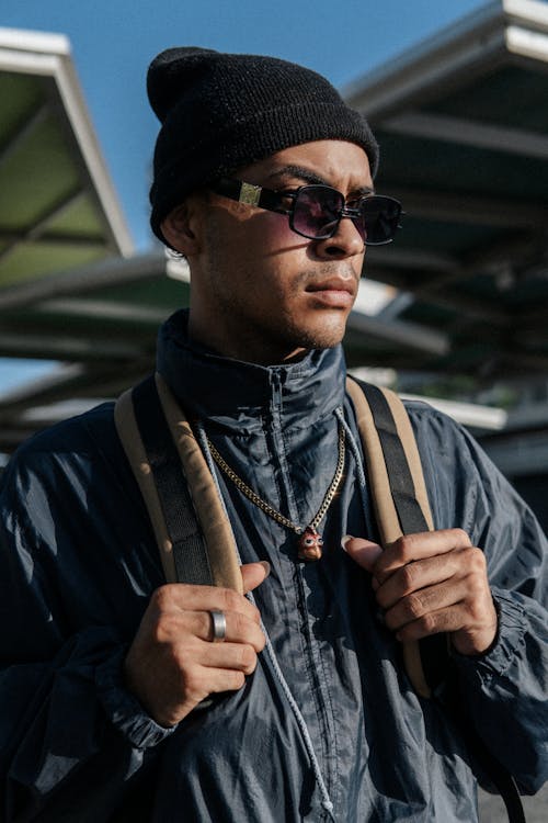 Portrait of Man in Cap and Sunglasses