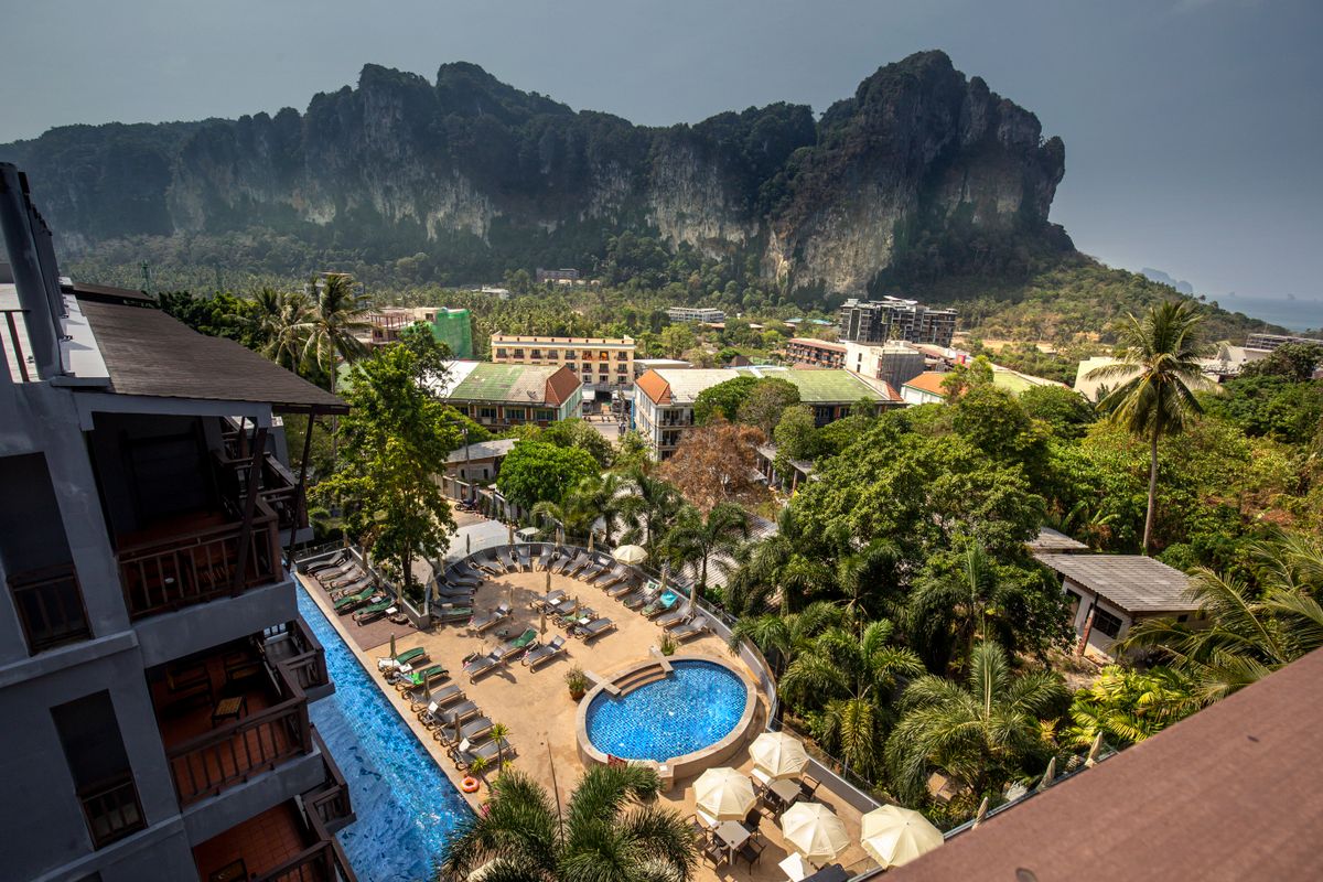 Aerial view of a tropical resort with mountains in Ao Nang, Thailand.