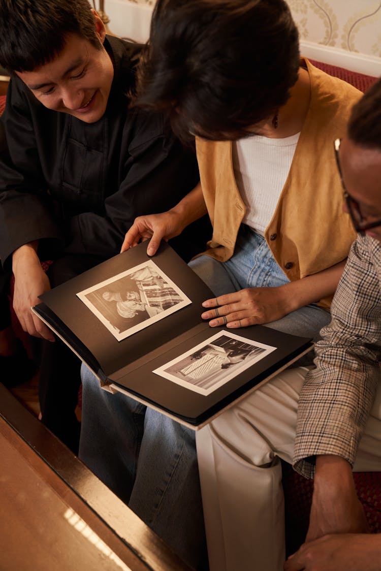 Family Watching Old Photos