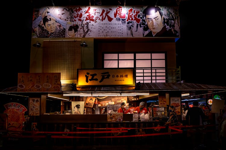 Asian Restaurant With Outdoor Advertising At Night