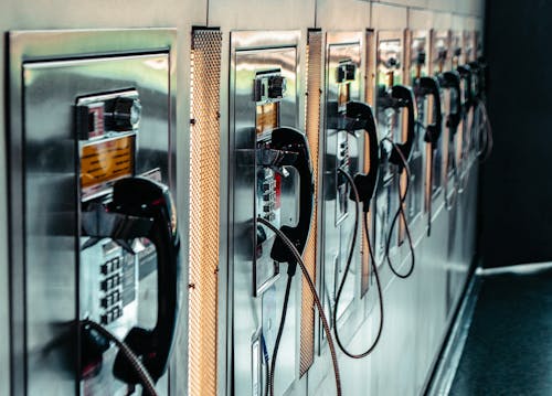 A Row of Coin Operated Telephones