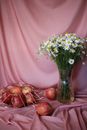 Ruddy Apples in Metal Basket and Bunch of Marigolds