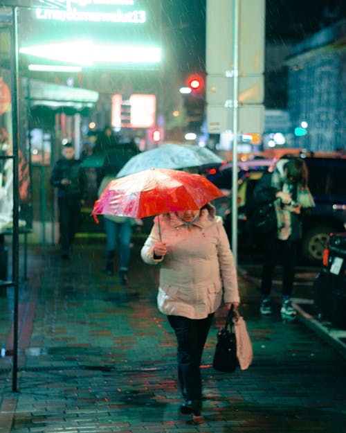 A Shot of of a Busy Street During Rain 