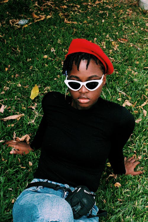 Portrait of Woman Laying on Grass