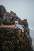 Woman on a rocky cliffside — photo by Marcus Queiroga Silva on Pexels