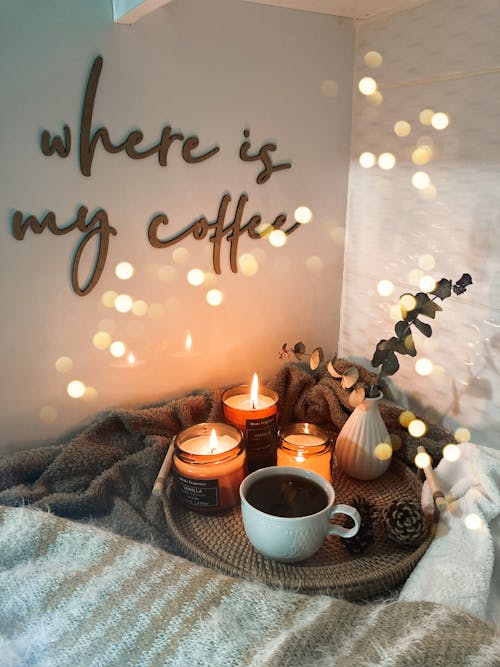 Cup of Coffee on a Tray with Candles