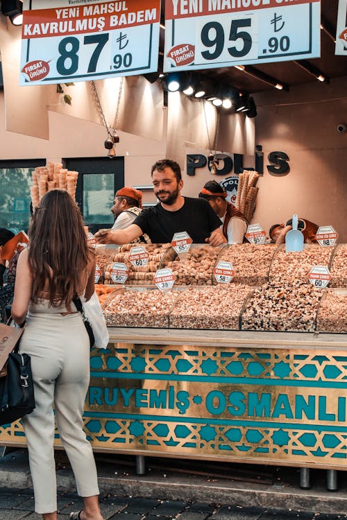 Woman Buying Food on a Turkish Bazaar 